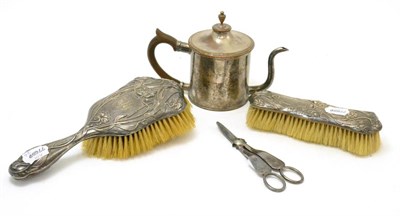 Lot 21 - Silver plated argyll, circa 1900, a silver backed hairbrush, clothes brush and a pair of grape...