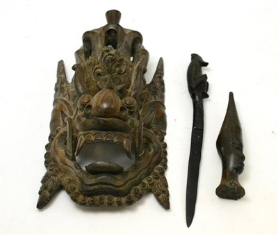 Lot 33 - An Eastern carved rosewood mask etc