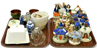 Lot 37 - Twelve Staffordshire pastille burners/figural clock, jelly moulds, two papier mache dishes etc, one