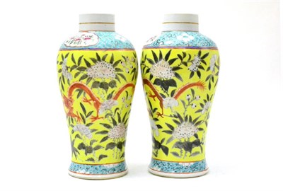 Lot 43 - A pair of Chinese yellow ground baluster vases, 27cm high