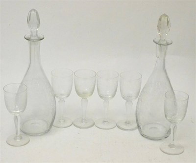 Lot 44 - A 19th century set of six etched glass wines together with a pair of matching decanters