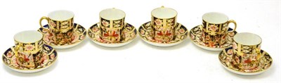 Lot 54 - A set of six Royal Crown Derby Imari coffee cans and saucers