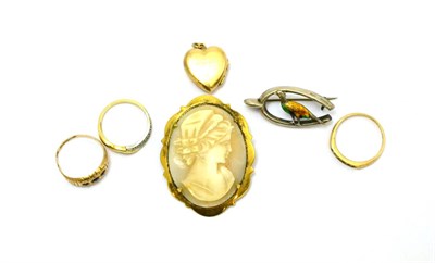 Lot 62 - Three 9ct gold stone set rings, a 9ct gold heart shaped locket, silver brooch and gilt metal...