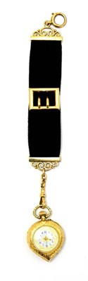 Lot 64 - A ladies Continental gold fob watch in the shape of a heart and stamped '14K' on a velvet fob...