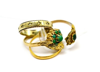 Lot 86 - A 22ct gold band and three rings (a.f.)