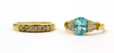 Lot 105 - A 9ct gold tourmaline and diamond dress ring and a half hoop ring (2)