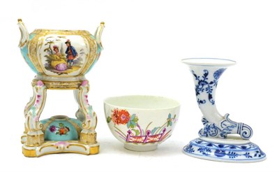 Lot 120 - Berlin perfumer, circa 1890, Meissen cornucopia in blue and white and Meissen tea bowl (3)