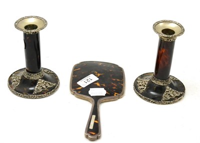 Lot 121 - A pair of silver mounted tortoiseshell candlesticks together with a silver and tortoiseshell backed