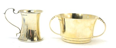 Lot 122 - A silver loving cup together with a silver Christening mug (2)