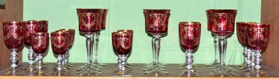 Lot 146 - A suite of thirty-six cranberry 'Bohemia Glass' glasses