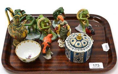 Lot 173 - A collection of assorted frog figures, porcelain birds etc