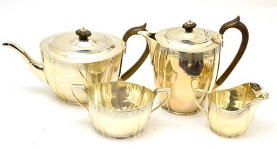 Lot 176 - A four piece silver tea service, marked for London