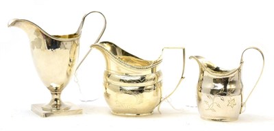 Lot 189 - Three silver cream jugs including two George III and a 20th century example