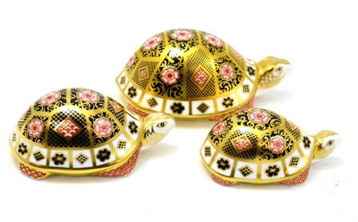 Lot 200 - Three Royal Crown Derby Yorkshire Rose tortoises, all with gold stoppers, with boxes and...