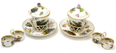 Lot 211 - Two Continental porcelain trembleuse cups and covers and two salts