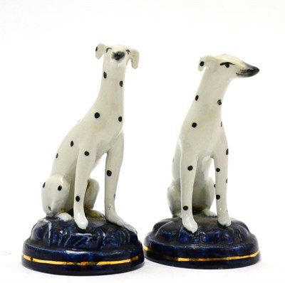 Lot 217 - A pair of mid 19th century Staffordshire figures of dalmatians