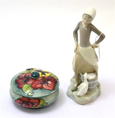 Lot 224 - Moorcroft jar and cover in Hibiscus pattern, bearing Queen Mary label and Lladro figure of girl and