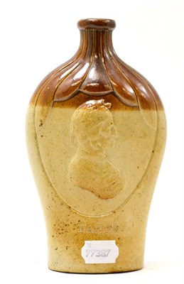 Lot 228 - A stoneware spirit flask decorated with Napoleon in relief opposed by Dante