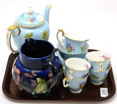 Lot 235 - Moorcroft Pansy pattern jug and crown Staffordshire part coffee set