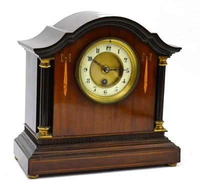 Lot 239 - An Edwardian mahogany and inlaid mantle clock