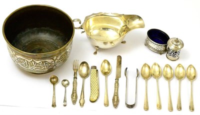 Lot 252 - A Cairoware bowl, silver sauce boat, a quantity of silver teaspoons, a silver salt, silver...