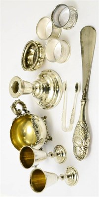 Lot 253 - A collection of small silver including three napkin rings, Judaica pedestal goblets, shoe horn,...