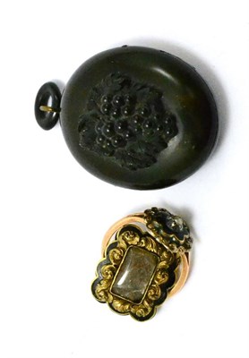 Lot 281 - A jet pendant, a mourning brooch and a mourning ring (3)