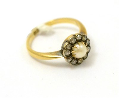 Lot 317 - A pearl and diamond cluster ring