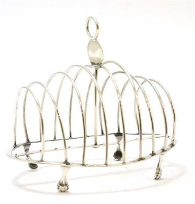 Lot 324 - A George III silver eight division toast rack