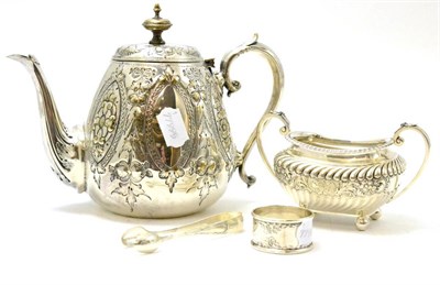 Lot 327 - A silver two handled sugar basin, Sheffield, silver napkin ring, plated teapot and sugar tongs