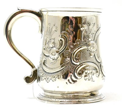 Lot 330 - A Georgian silver tankard (later repousse work)