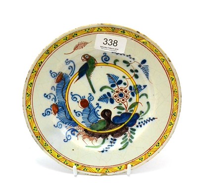 Lot 338 - A Delft plate with bird decoration