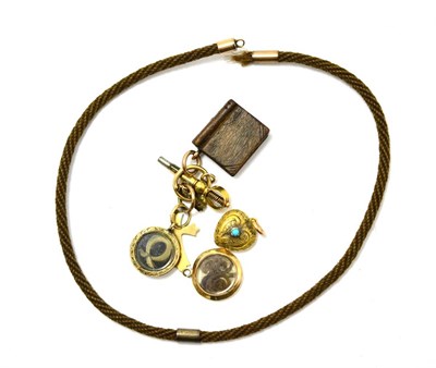 Lot 397 - A group of mourning jewellery including a Victorian hair bracelet, a turquoise set yellow metal...