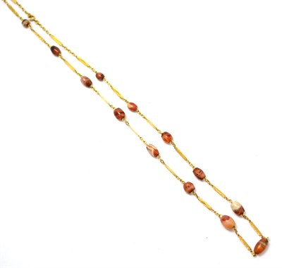 Lot 410 - An 18ct gold and agate bead necklace