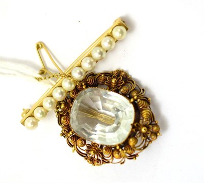 Lot 412 - A Milanese gold brooch set with a blue topaz and a 9ct gold cultured pearl bar brooch