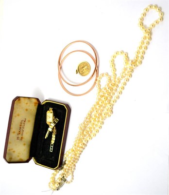 Lot 428 - Everite wristwatch, two bangles, a St Christopher's pendant, and two pearl necklaces