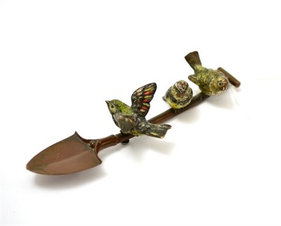 Lot 434 - An Austrian cold painted bronze of birds on a shovel, stamped Geschutz