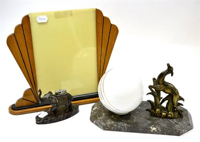 Lot 445 - An Art Deco table lamp mounted with a faun on a grey veined marble base, an elephant form table...