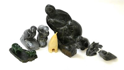 Lot 447 - A group of Inuit marble and other carvings of figures and animals (9)