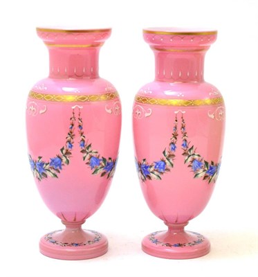 Lot 460 - A pair of pink opaline vases, 25cm high