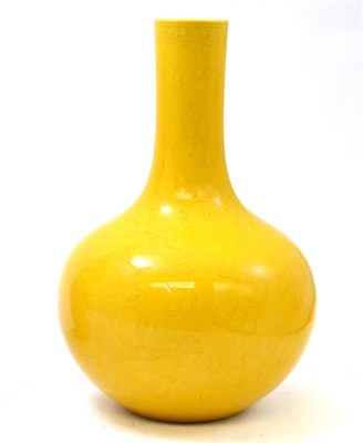 Lot 461 - Chinese yellow glazed bottle vase with incised dragon decoration, 29cm high