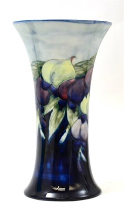 Lot 494 - A William Moorcroft Wisteria pattern trumpet vase (a.f.), 26cm high