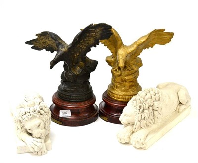 Lot 507 - A pair of French spelter eagles together with a pair of reproduction Canova lions