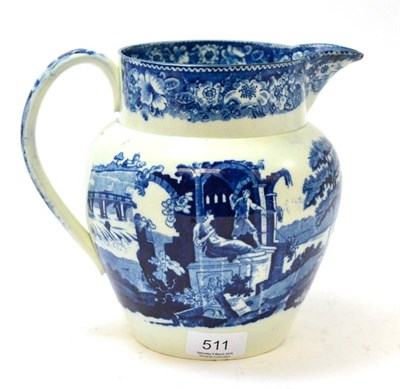 Lot 511 - An early English blue and white jug, decorated with figures in landscapes