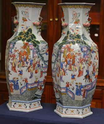 Lot 512 - A pair of Chinese Canton hexagonal section floor vases, 60cm high