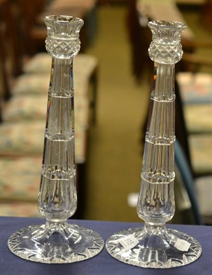 Lot 515 - A pair of glass candlesticks