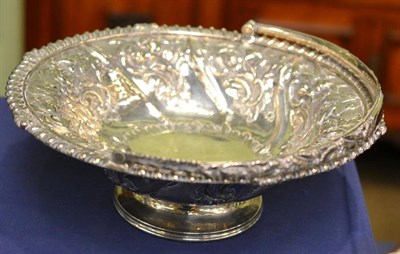 Lot 516 - A George III silver swing handle basket