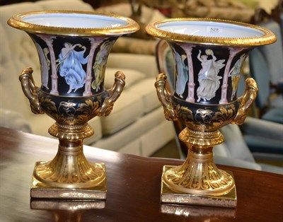 Lot 529 - A pair of Russian gilt and painted campana style urns, 40cm high