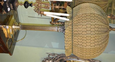 Lot 548 - A good silver plated Corinthian column lamp with a large fabric shade