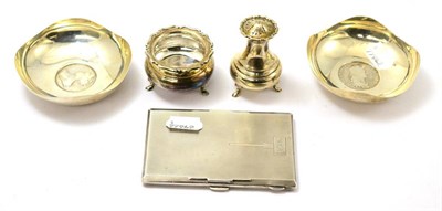 Lot 565 - Silverware comprising cigarette case, pair of table condiments and a pair of coin inset bowls